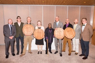 Finalists, winner, and jurors of the 2015 American Craft Council Rare Craft Fellowship Award in association with The Balvenie (left to right): David Stewart, Garth Johnson, Mark Hewitt, Elizabeth Brim, Mary Jackson, Anthony Bourdain, Bob Kramer, James Fox, and Perry Price. Photo: Joe Gallo, courtesy of Magrino 